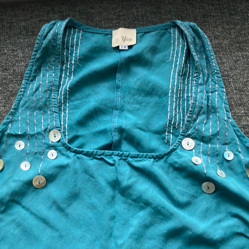 Teal linen dress with pockets.